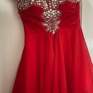 Elegant Red Gown with Embellished Bodice